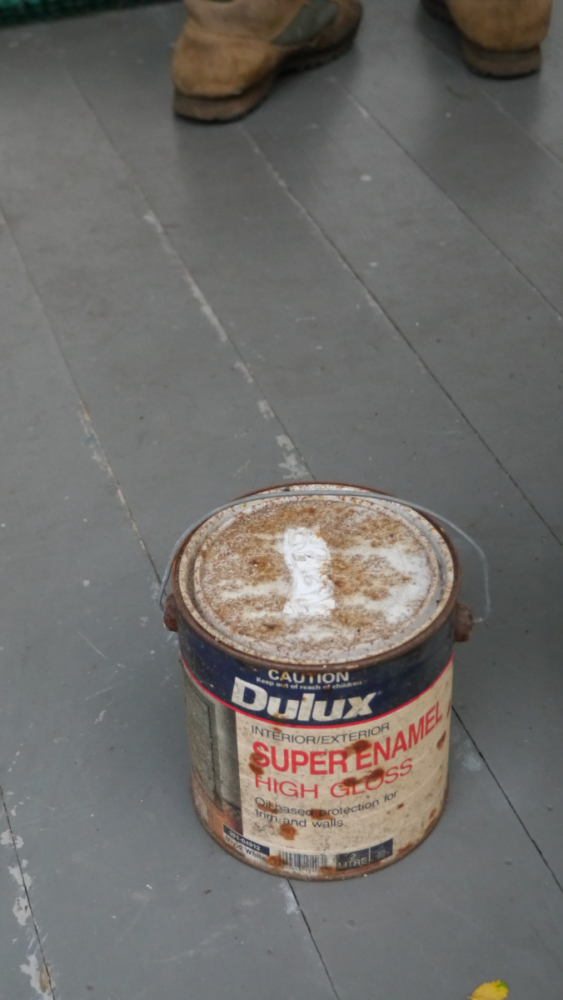 2 litre gloss white oil based enamel Dulux paint. Old tin perhaps 10
