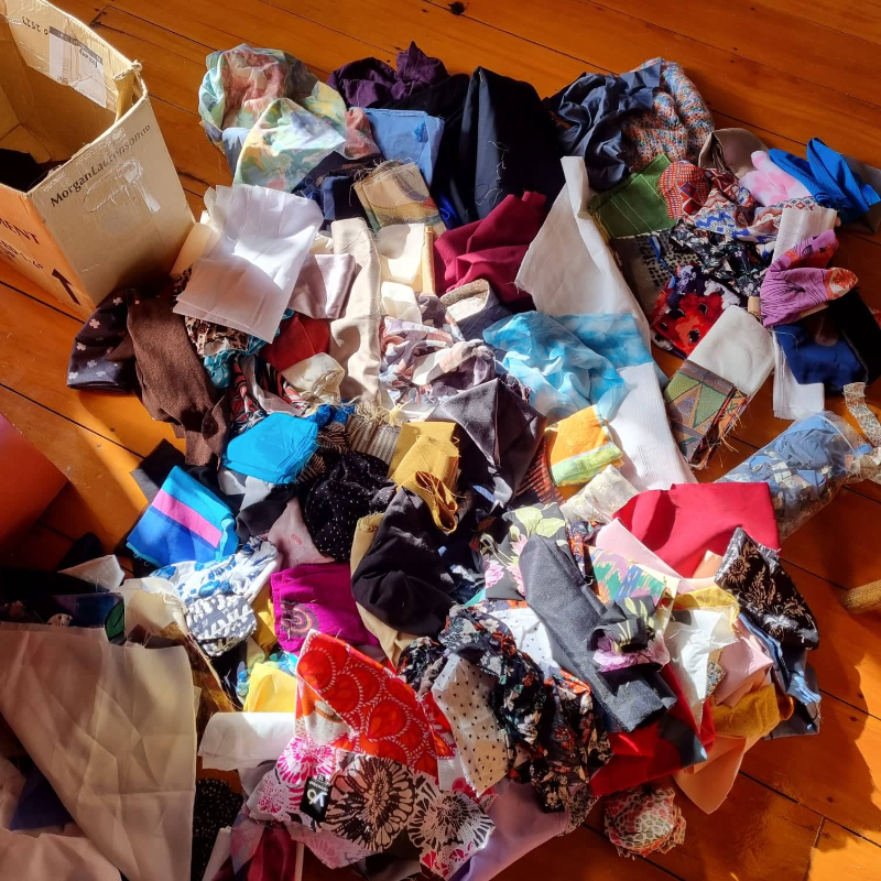 box crammed with fabric remnants | Freestuff