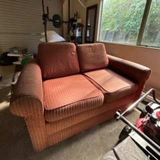 Red two seater couch