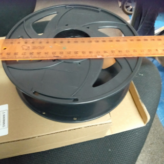 Cardboard box with plastic spools about 20 units