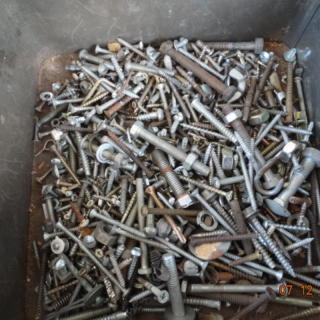 Tin of assorted bolts nuts and screws