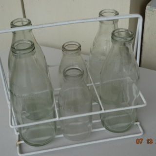 Milk bottle carrier and bottles