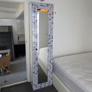 Tall storage cabinet
